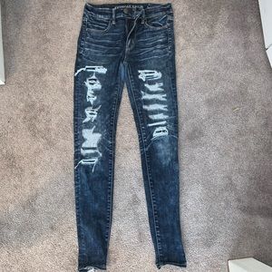 Dark blue distressed American eagle jeans size 2